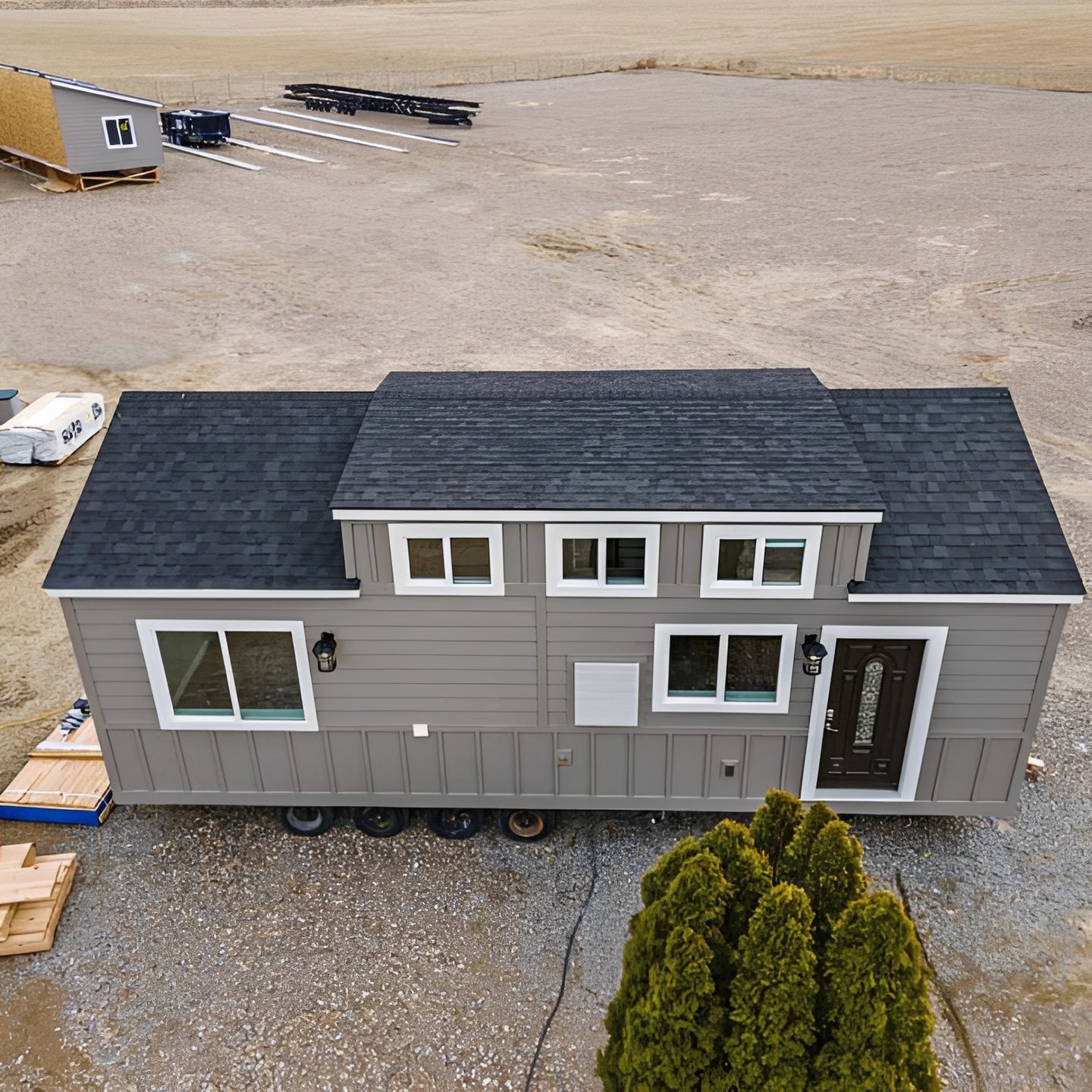Tiny home on wheels in a field