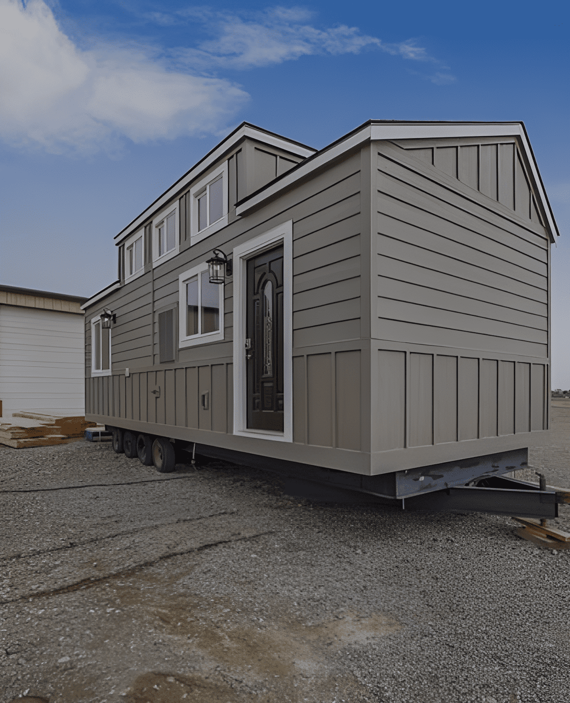 Compact gray house with small windows.